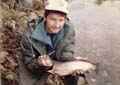 ALAN DUDLEY WITH A LARGE BROOKTROUT
